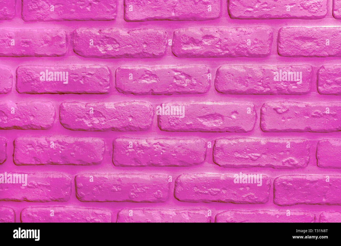 Plastic pink bricks background. Color of 2019 year. Modern trendy texture for design Stock Photo