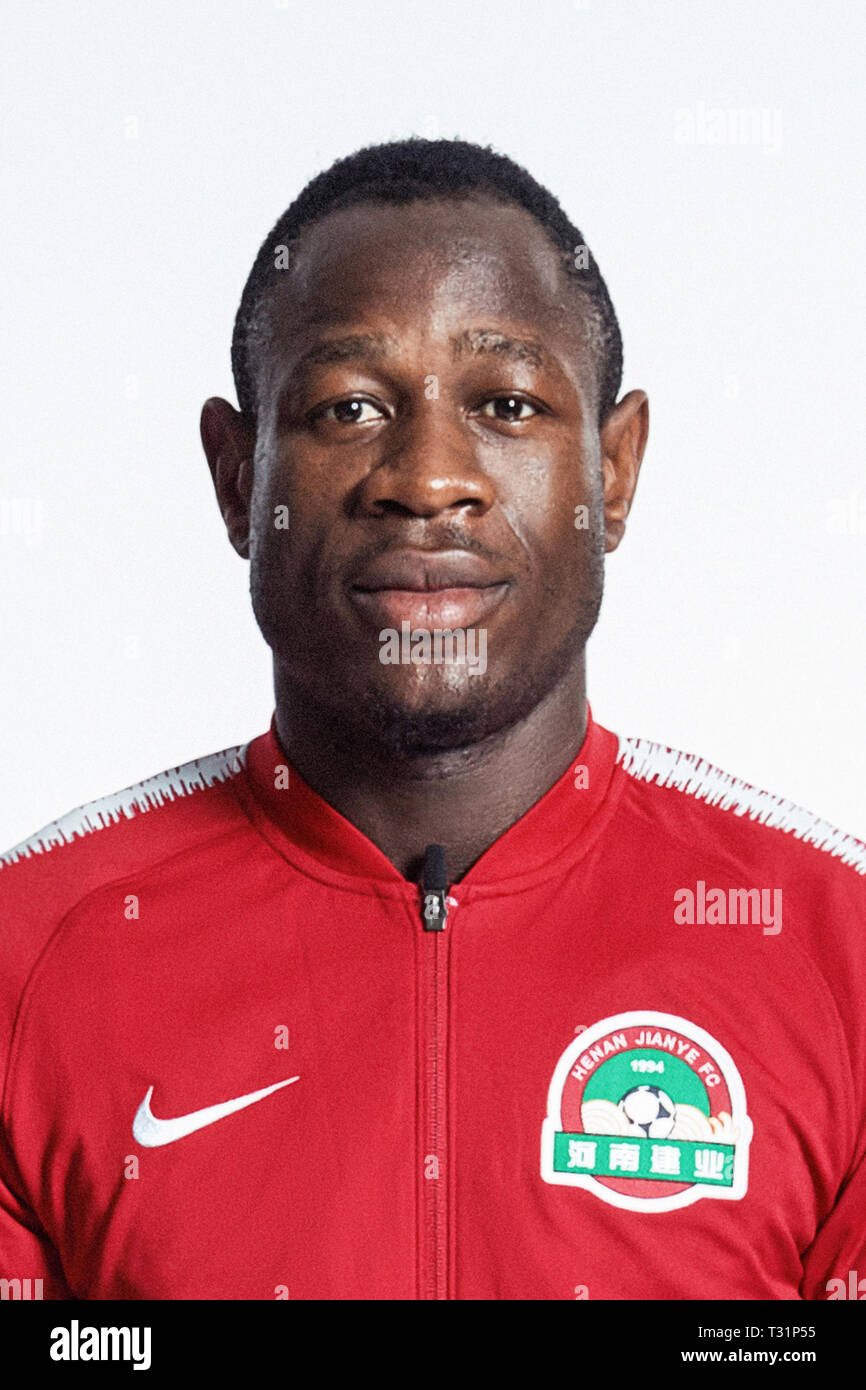 **EXCLUSIVE**Cameroonian football player Christian Bassogog of Henan Jianye F.C. poses during the filming session of official portraits for the 2019 Chinese Football Association Super League, in Foshan city, east China's Guangdong province, 19 February 2019. Stock Photo