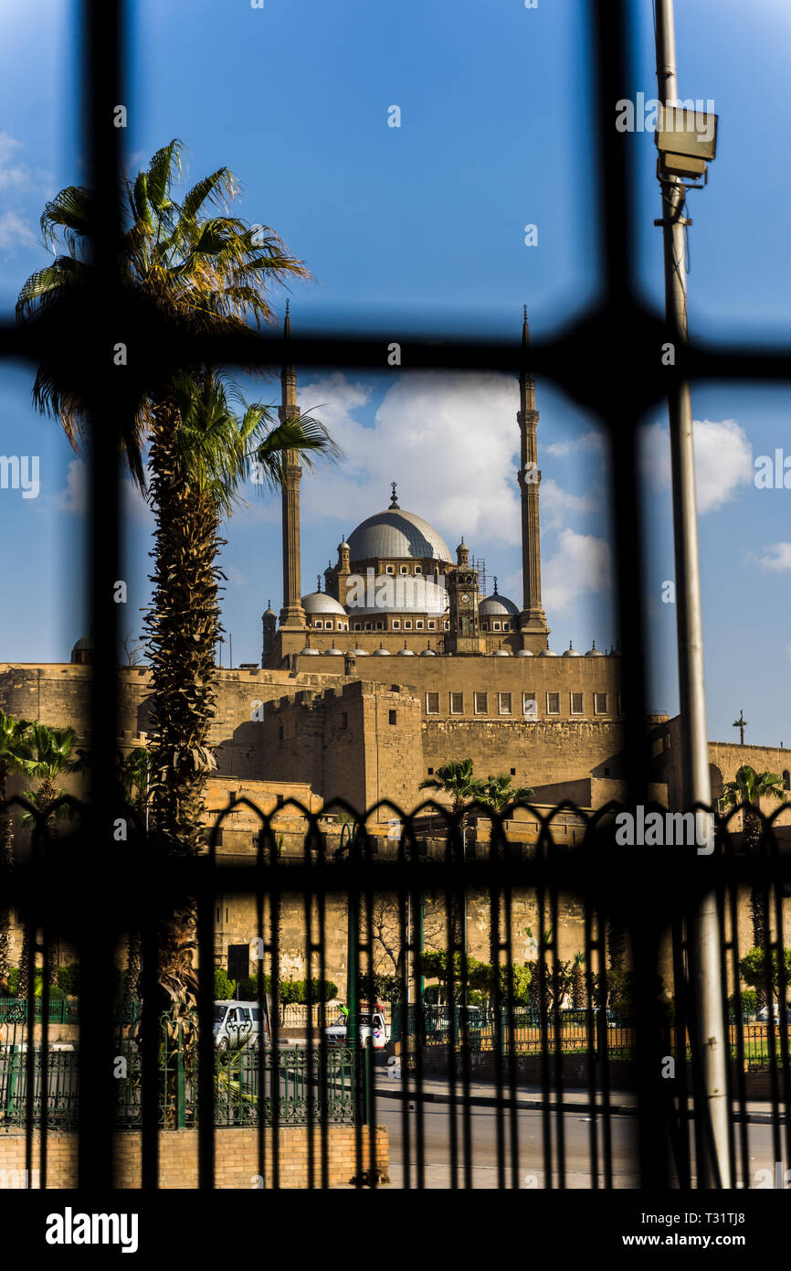 A view through a mosque gate of the Saladin Citadel and Mosque of Muhammad Ali Pasha Stock Photo