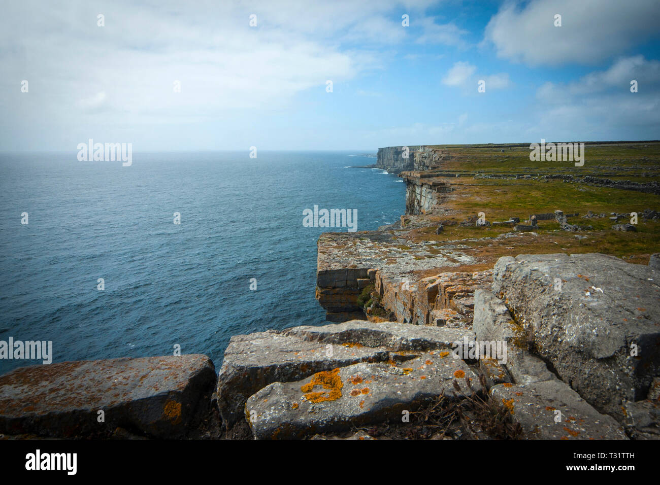 The imposing Dun Aengus Stone Fort, Inishmore, the Aran Islands, off Ireland's west coast. The fort is preched on a windswept 100-metre high cliff abo Stock Photo