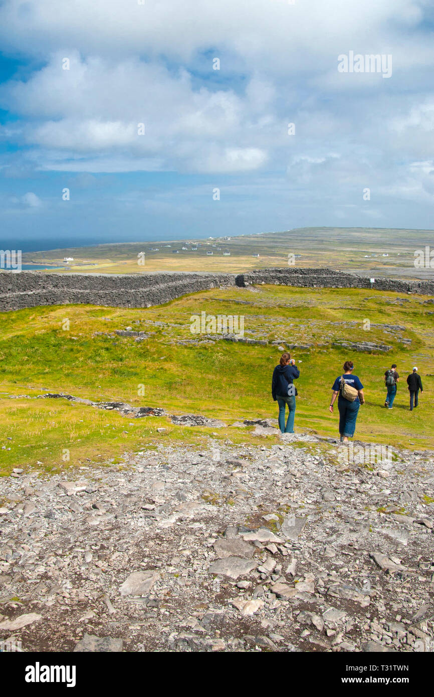 The imposing Dun Aengus Stone Fort, Inishmore, the Aran Islands, off Ireland's west coast. The fort is preched on a windswept 100-metre high cliff abo Stock Photo