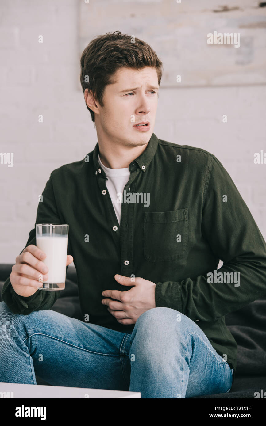 Man upset stomach hires stock photography and images Alamy