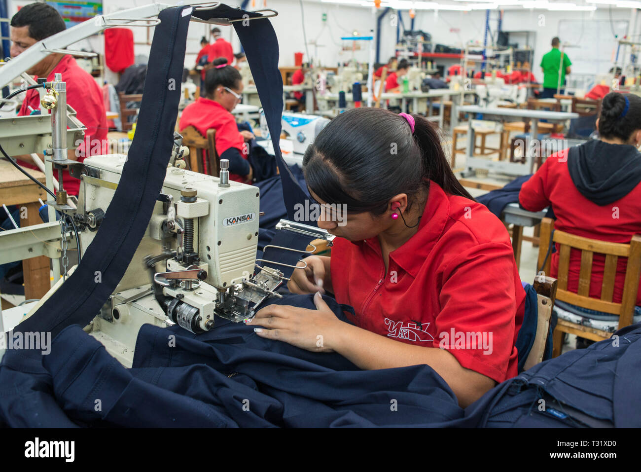 Donmatias, Antioquia, Colombia: Somos Jeans is a factory that produces for its own brand, Square, and for foreign brands such as Diesel in Italy. Stock Photo