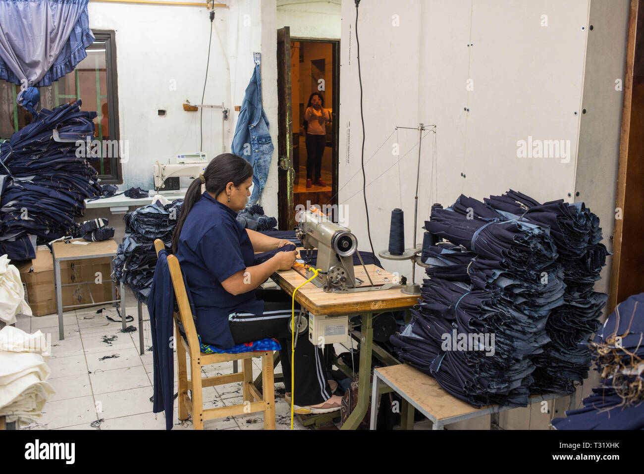 Donmatias, Antioquia, Colombia: Familiar jeans manufacturing in calle 46. Stock Photo