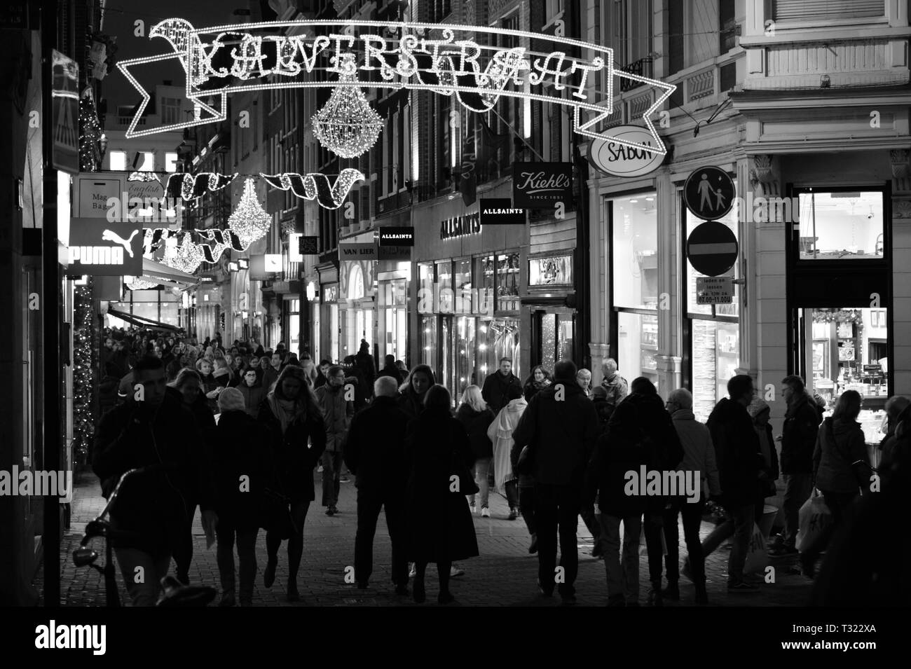 amsterdam - november 2017 shopping street in city center.black & white night shot. Stock Photo