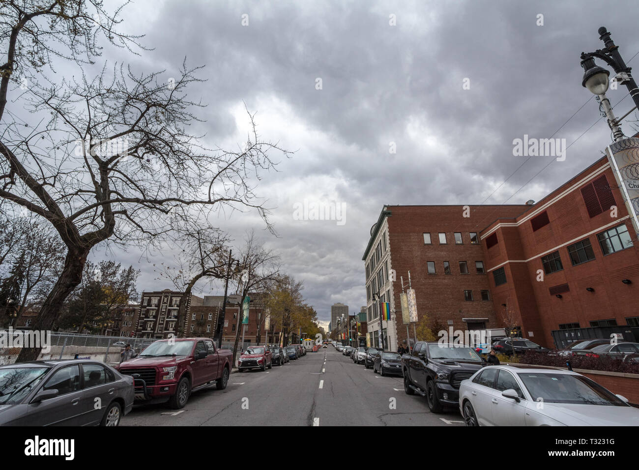MONTREAL, CANADA - NOVEMBER 8, 2018: Cars parked in a residential street with cars parked in le Village, Montreal, Quebec. A typical North American di Stock Photo