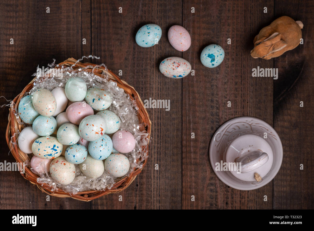 Basket full of Easter eggs and bell Stock Photo