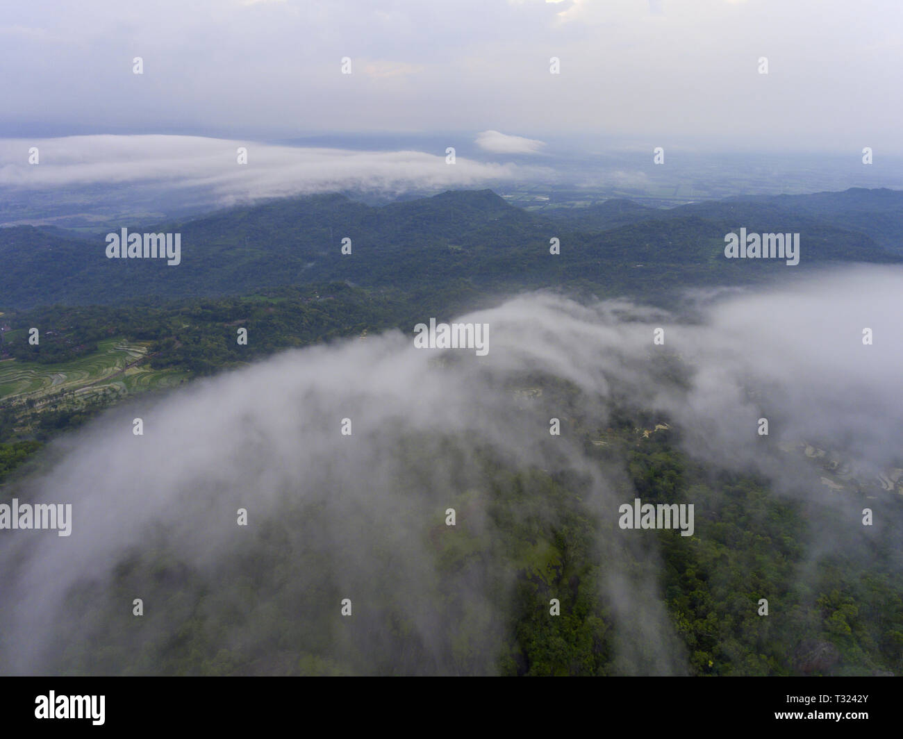 Cloud covered view of mountain area in Nglanggeran, near Yogyakarta Stock Photo