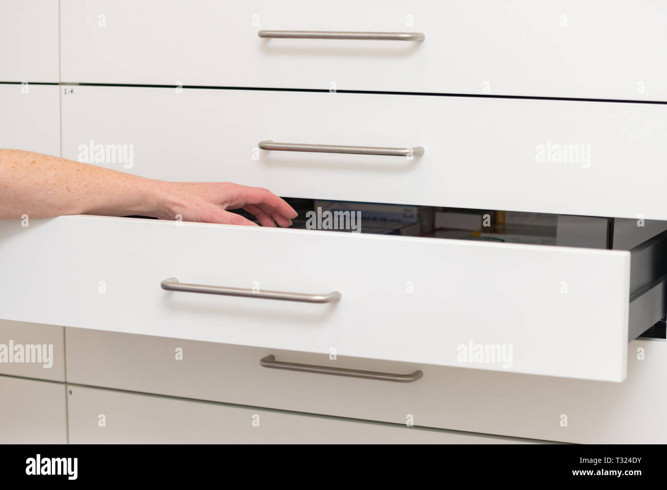 pharmacy cabinet from side of drawers Stock Photo