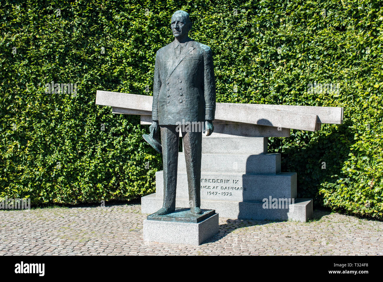 The statue of King Frederick IX of Denmark dressed in the uniform of an admiral. Stock Photo