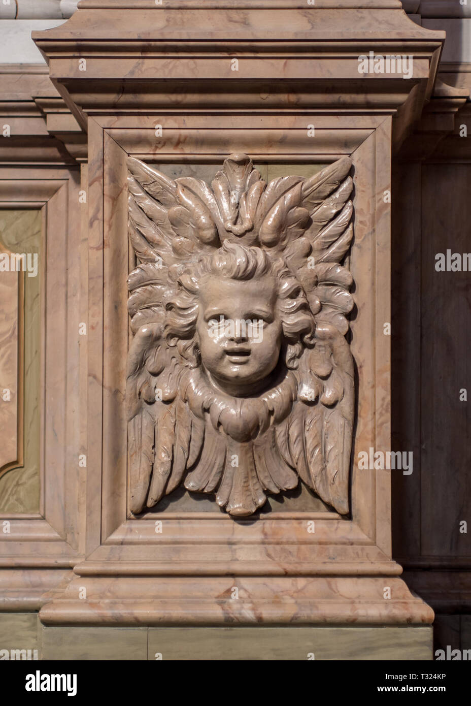 A cherub peers out from a marble pillar in Frederik's Church (the Marble Church) in Copenhagen. Stock Photo