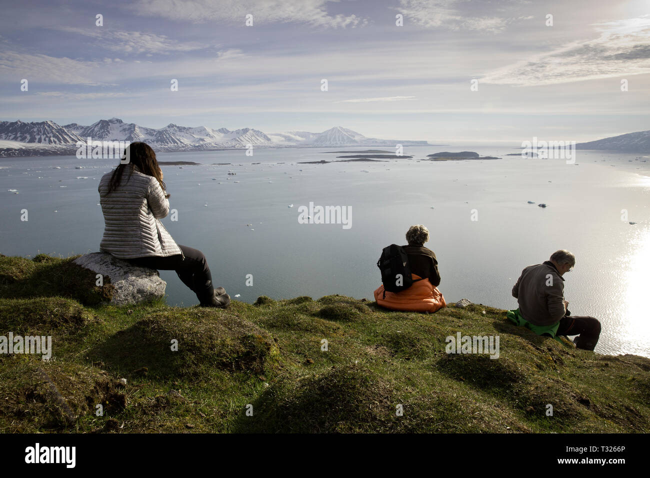 Tourists enjoying Panorama, Spitsbergen, Arctic Ocean, Norway Stock Photo