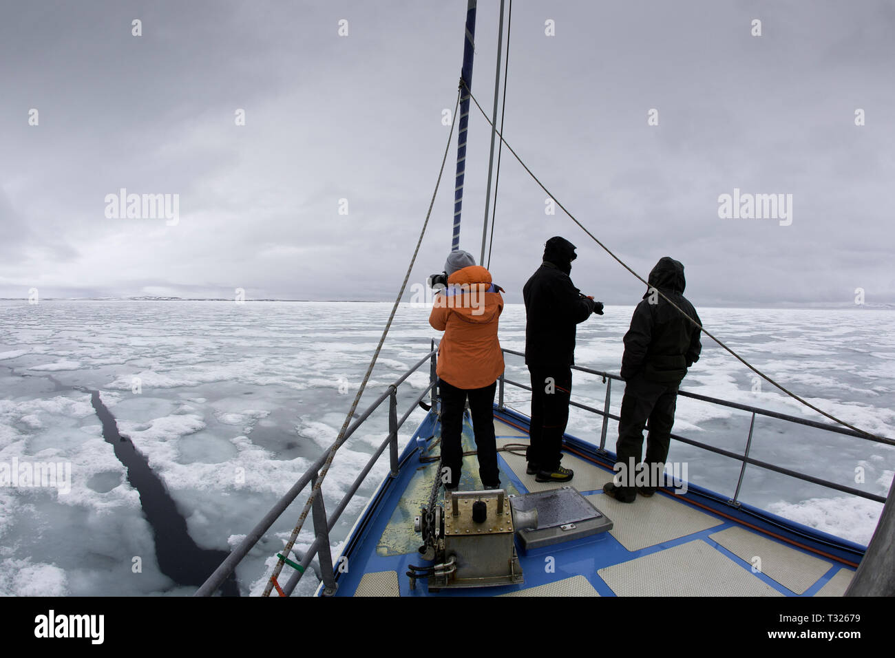 Tourists on Cruise Sail Boat, Spitsbergen, Arctic Ocean, Norway Stock Photo