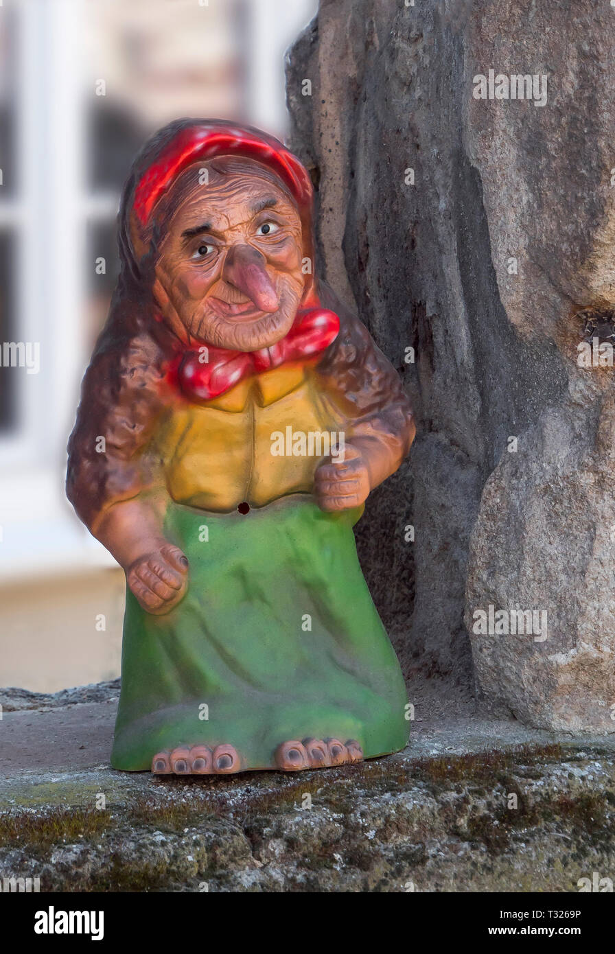 Old kind witch woman statue. No fear. Fairy tale Stock Photo