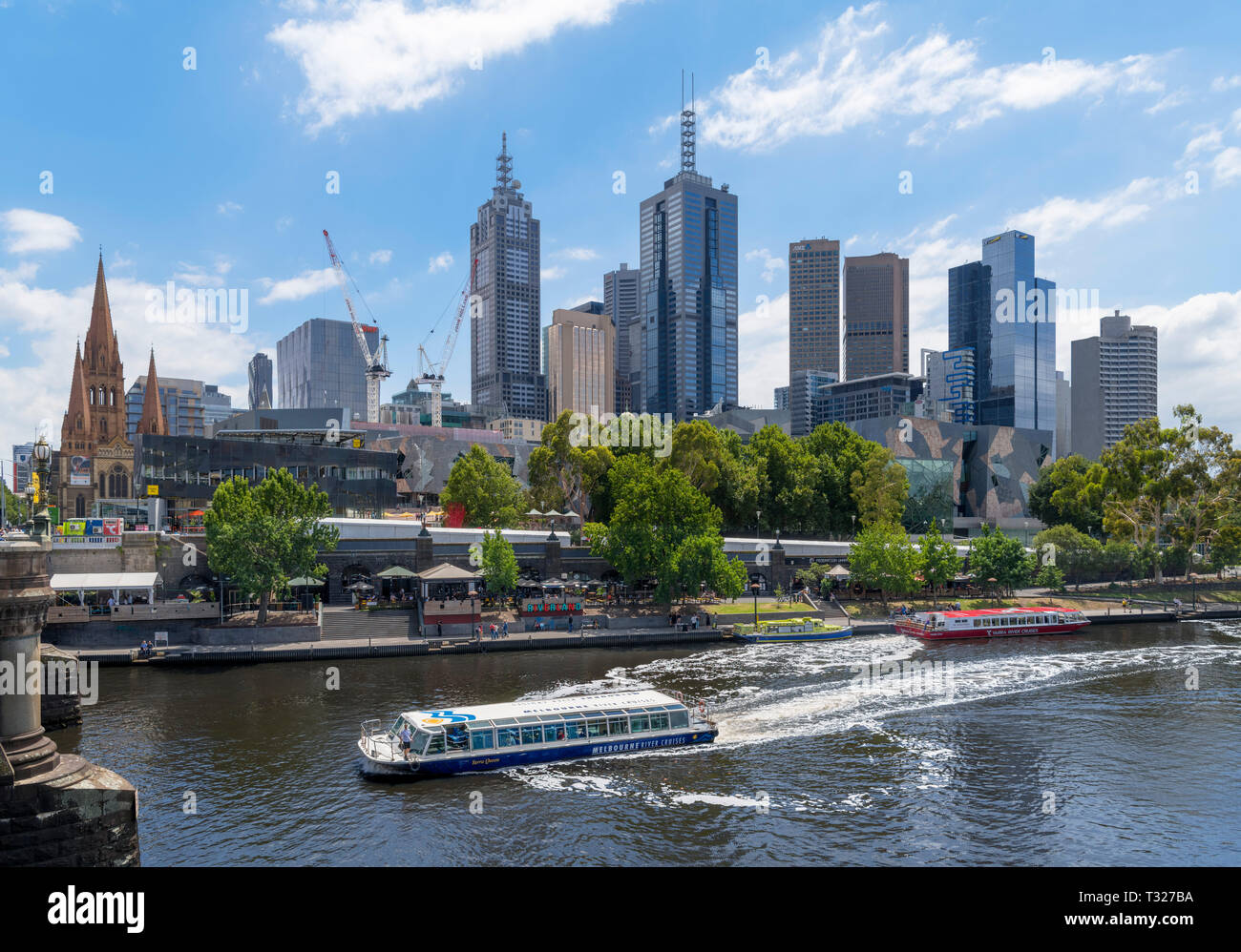 Melbourne River cruise boat on the Yarra River in front of the Central Business District (CBD), Princes Bridge, Melbourne, Victoria, Australia Stock Photo