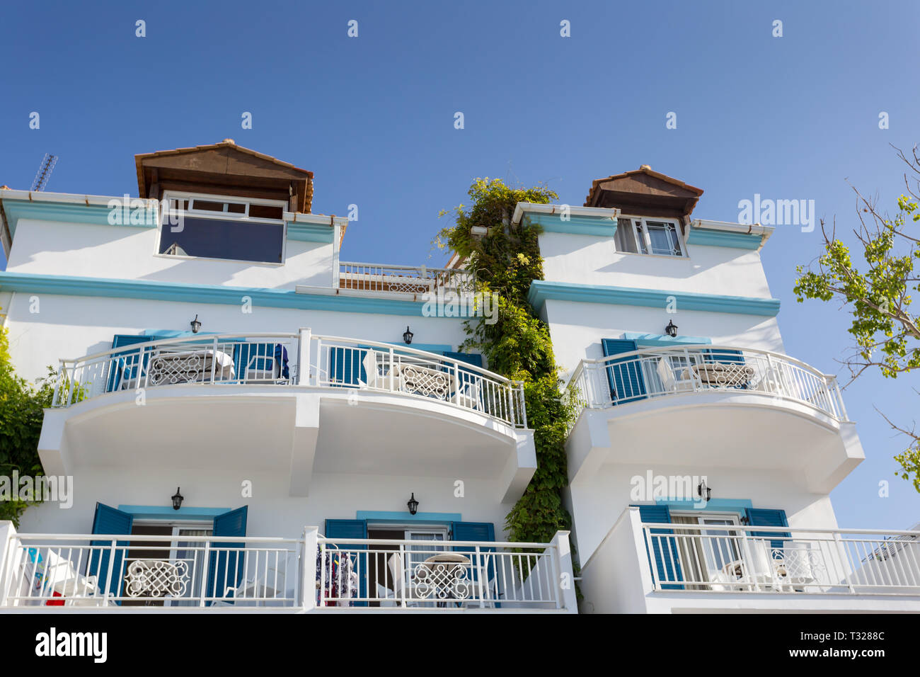Typical Greek style apartment house Stock Photo Alamy