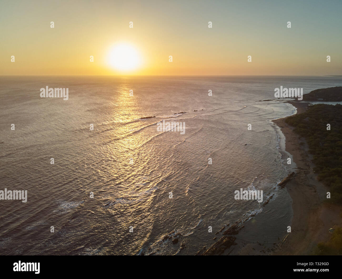 Scenic sunset background aerial view. Dusk coastline landscape Stock Photo