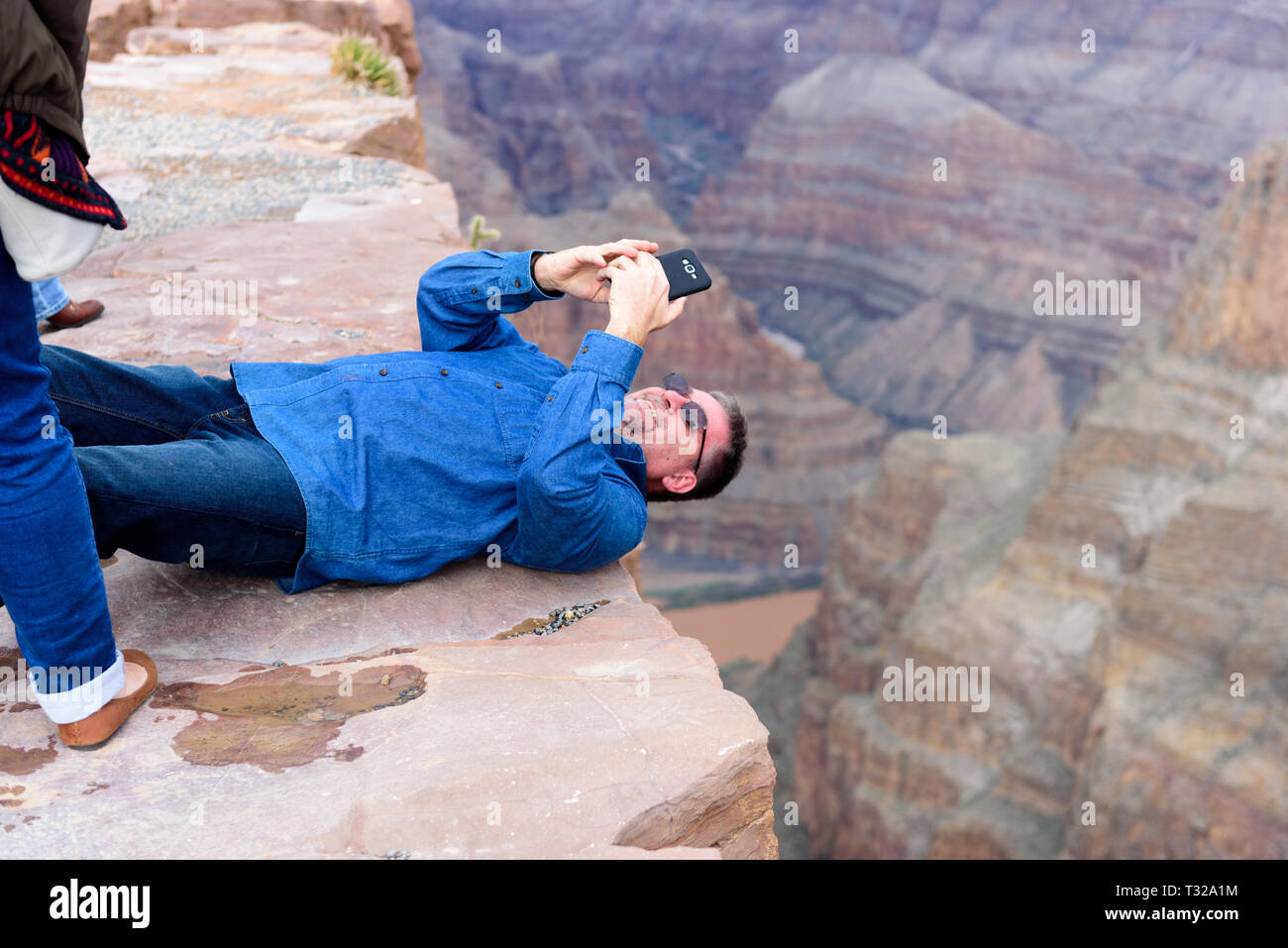 GRAND CANYON February 19 Tourists take pictures at Eagle Point at