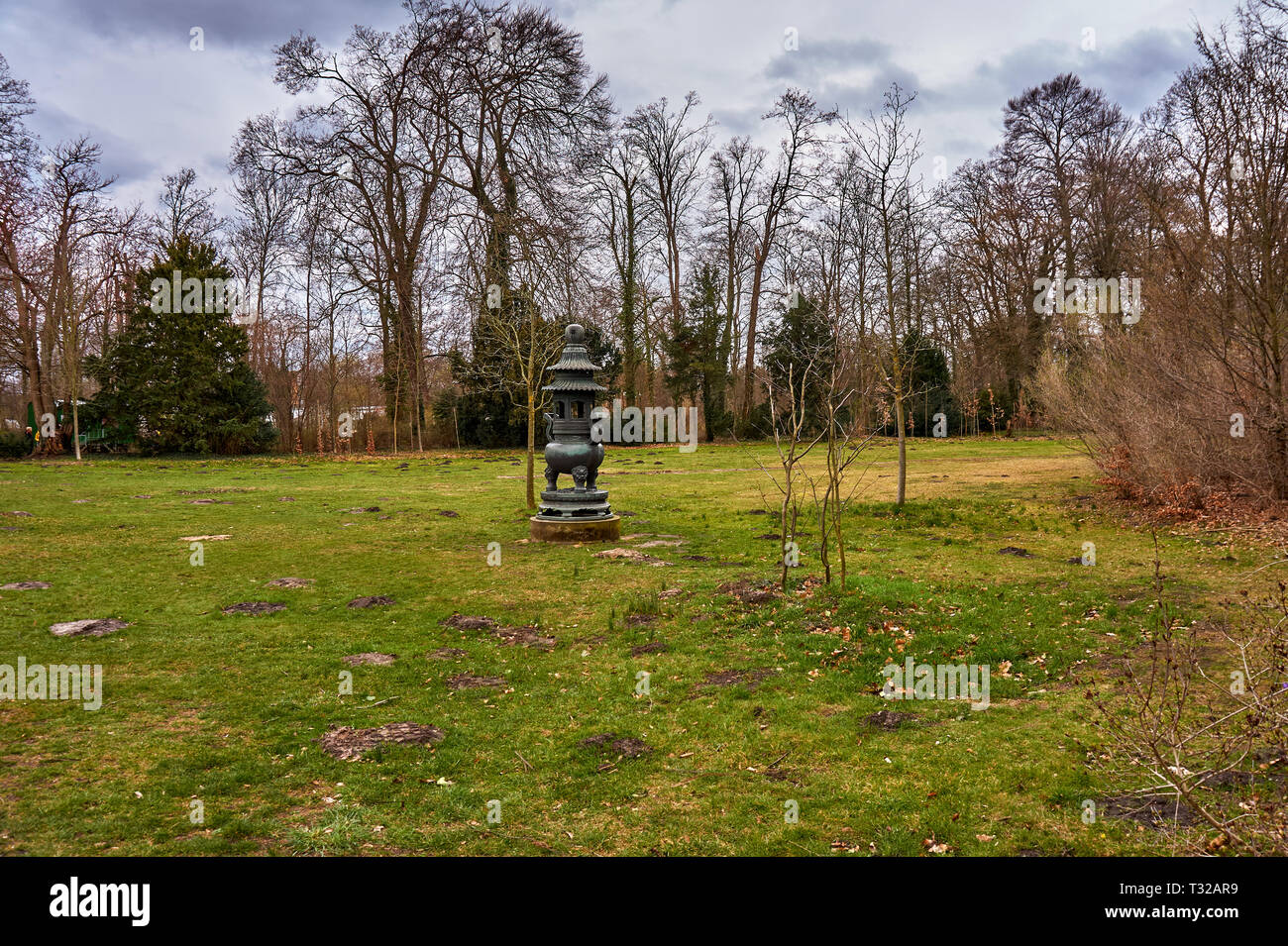 Beautiful scenery from the park of the Grand Sanssouci summer palace against a cloudy sky in Potsdam, state Brandenburg. Germany. Stock Photo