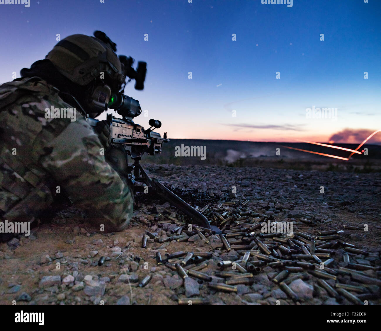 A Green Beret assigned to 3rd Special Forces Group (Airborne) fires the M240B machine gun, April 2, 2019 at Fort Bragg, NC. Green Berets fired multiple weapon systems during the live fire range to include the M2 .50 caliber machine gun, M320 grenade launcher and the M249 Squad Automatic Weapon. (U.S. Army photo by Sgt. Steven Lewis) Stock Photo