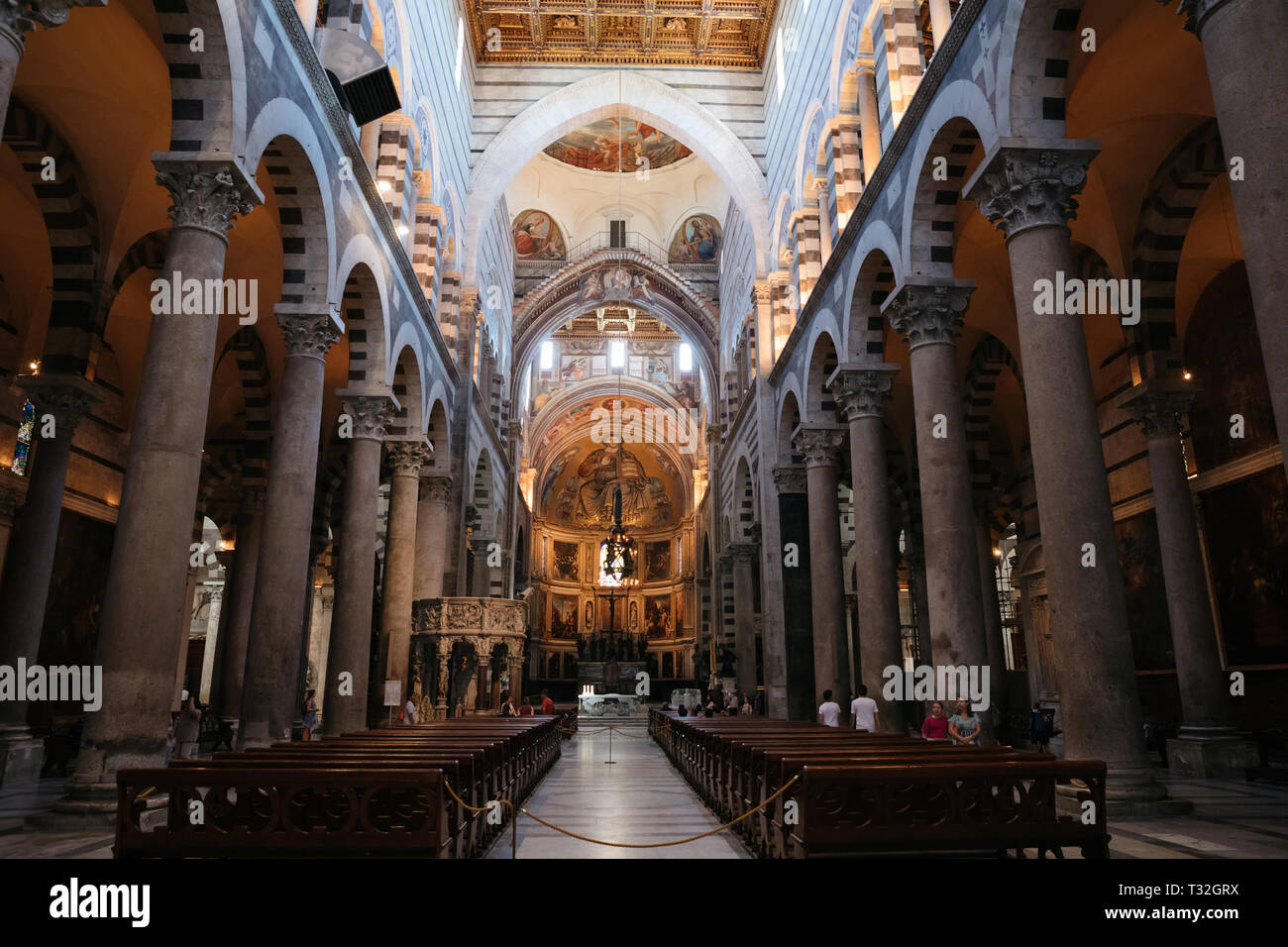 Pisa, Italy - June 29, 2018: Panoramic view of interior of Pisa Cathedral (Cattedrale Metropolitana Primaziale di Santa Maria Assunta) is a medieval R Stock Photo