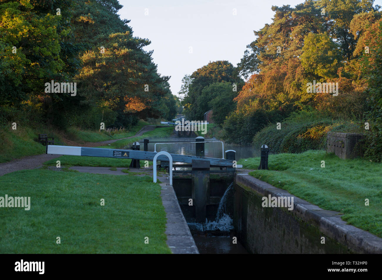 Looking up the famous Audlem Lock Flight on the Shropshire Union Canal from Lock 11, Audlem, Cheshire, England Stock Photo