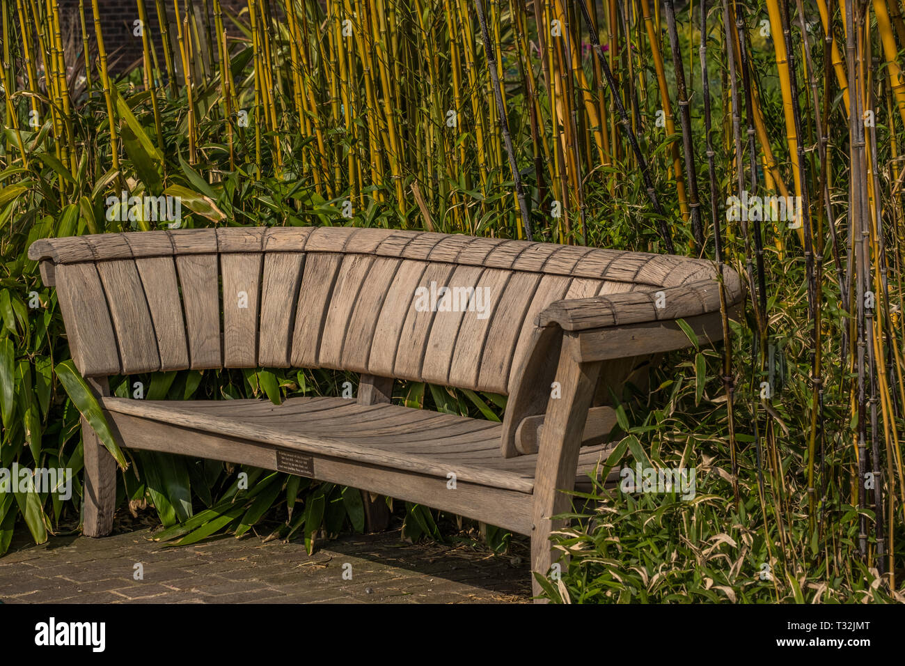 Wooden Garden bench chair Stock Photo