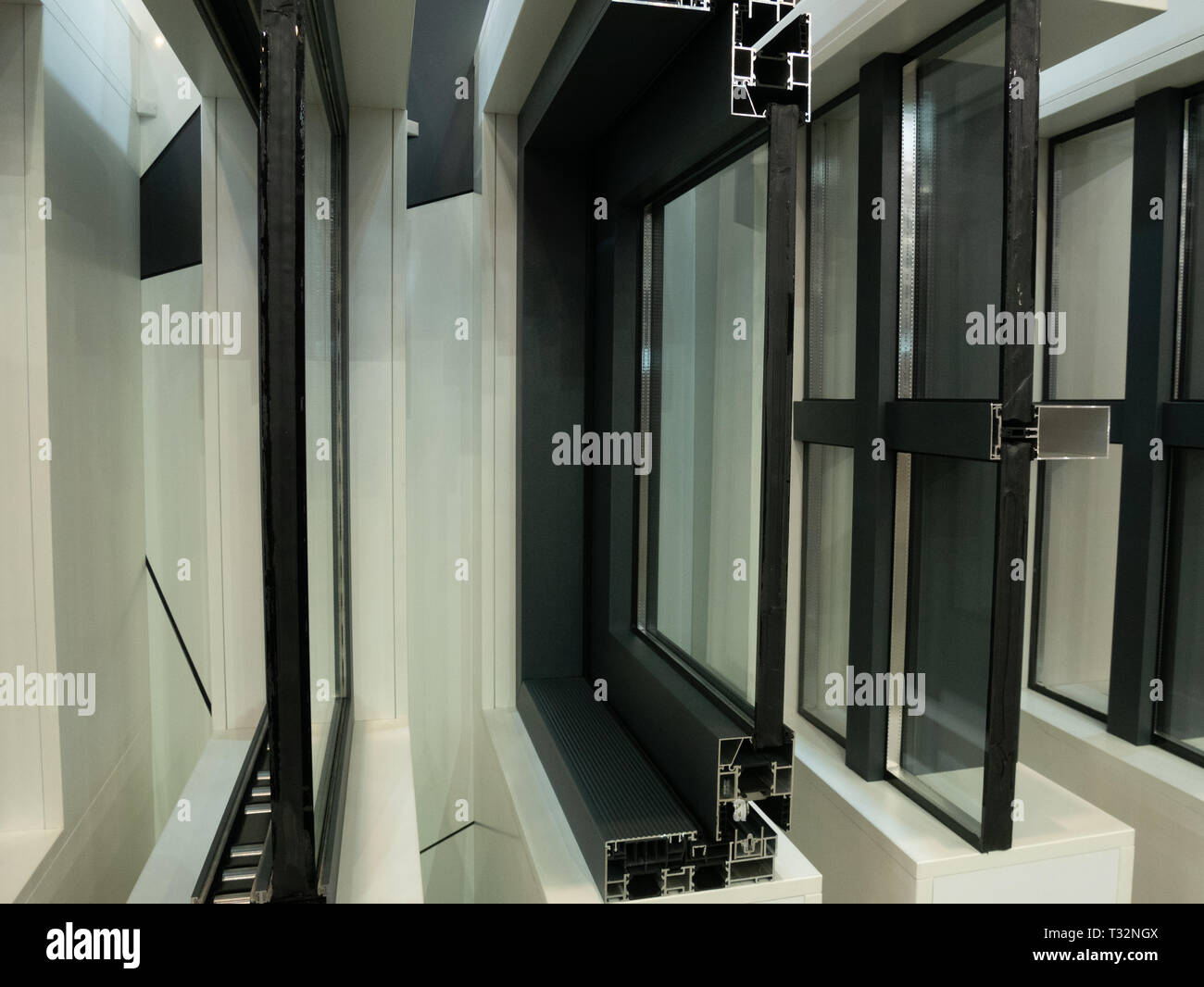 showcase of modern aluminum plastic windows frames in a row. cutted for