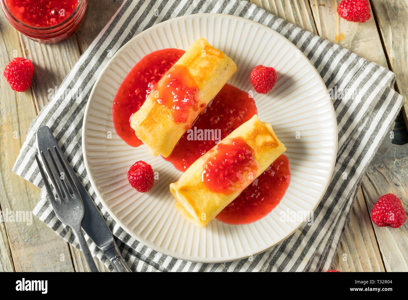Sweet Homemade Cheese Blintzes with Raspberry Sauce Stock Photo Alamy