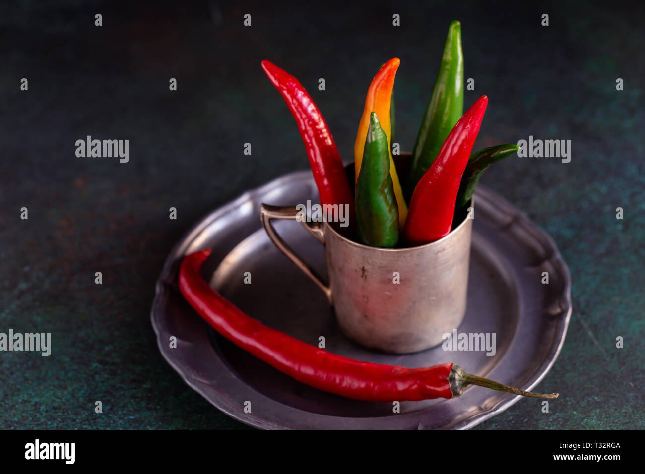 Chili peppers in cup hi-res stock photography and images - Alamy