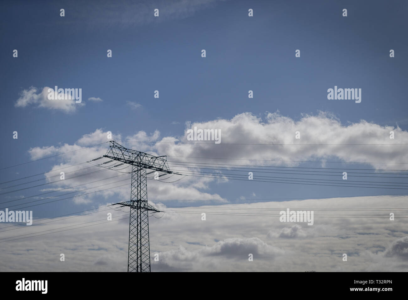 The blue sky is streaming with clouds Stock Photo