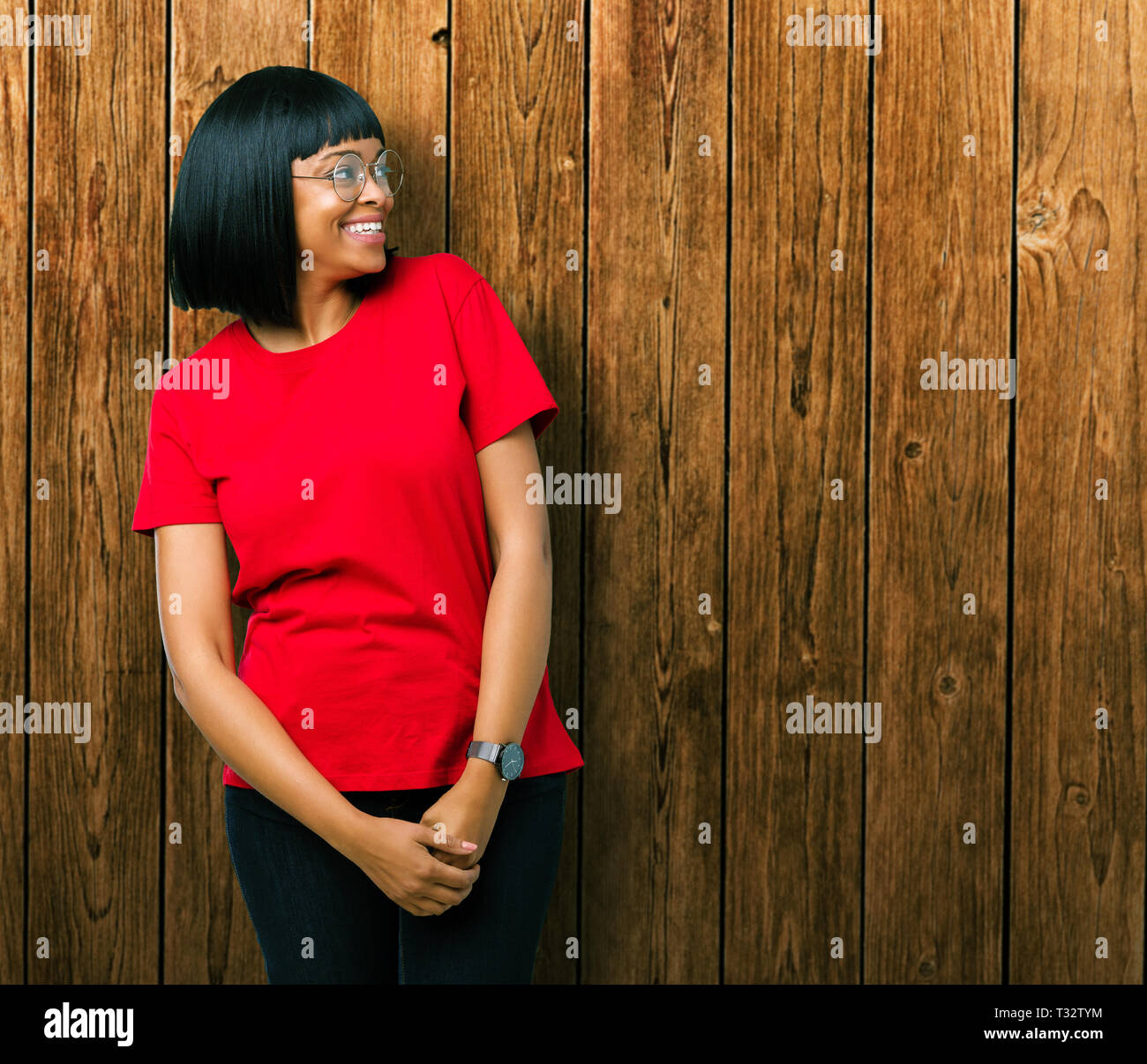 Beautiful young african american woman wearing glasses over isolated ...