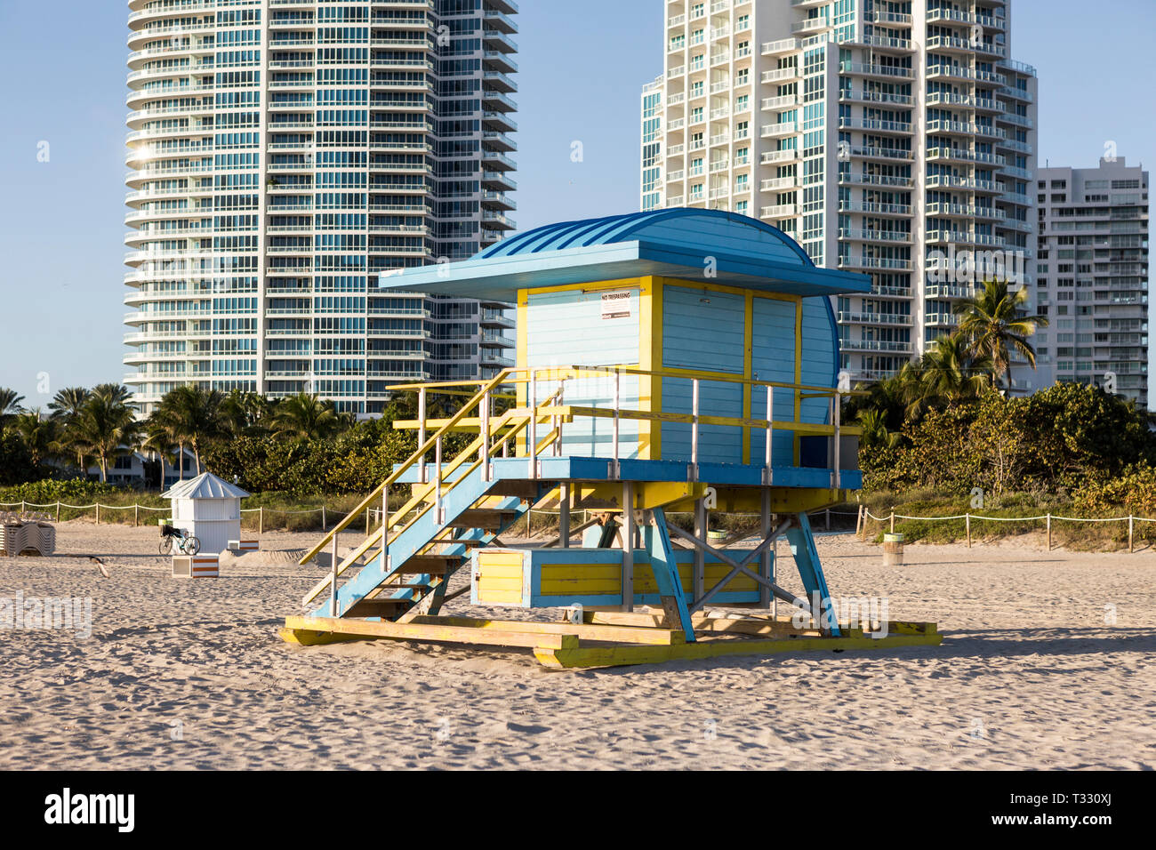 An iconic lifeguard tower with apartment buildings in the background on Miami Beach, Florida, USA Stock Photo