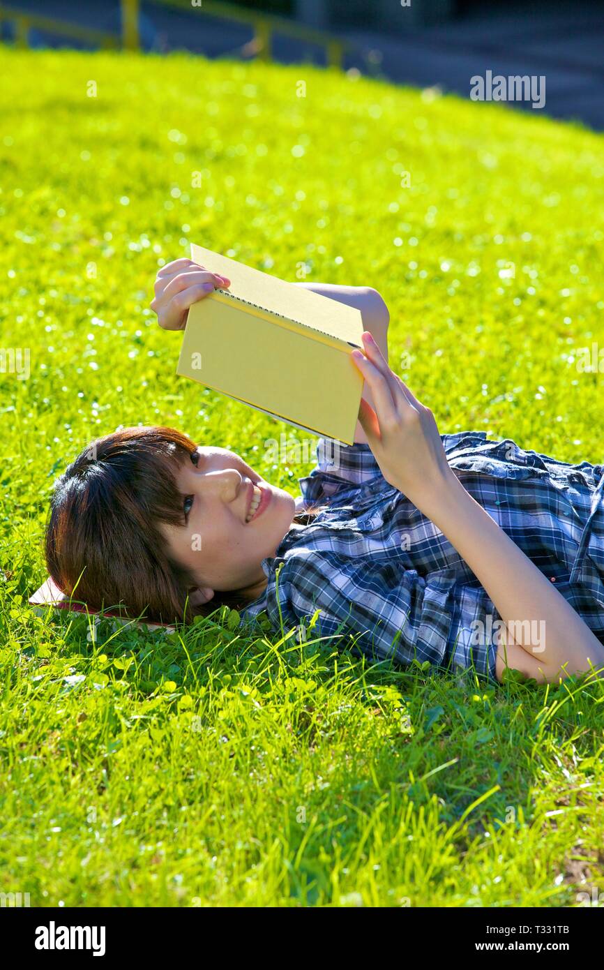 Asian Female Student Studying Stock Photo