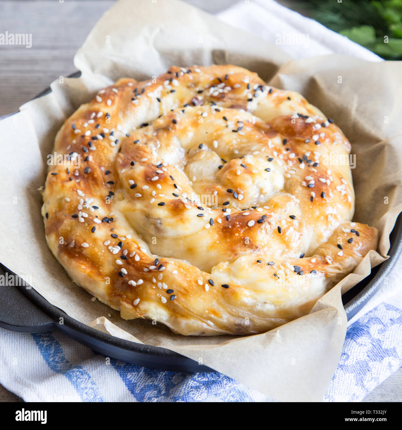 Vertuta, traditional Romanian, Moldavian or Balkan baking pie. Spiral filo pastry pie. Stock Photo