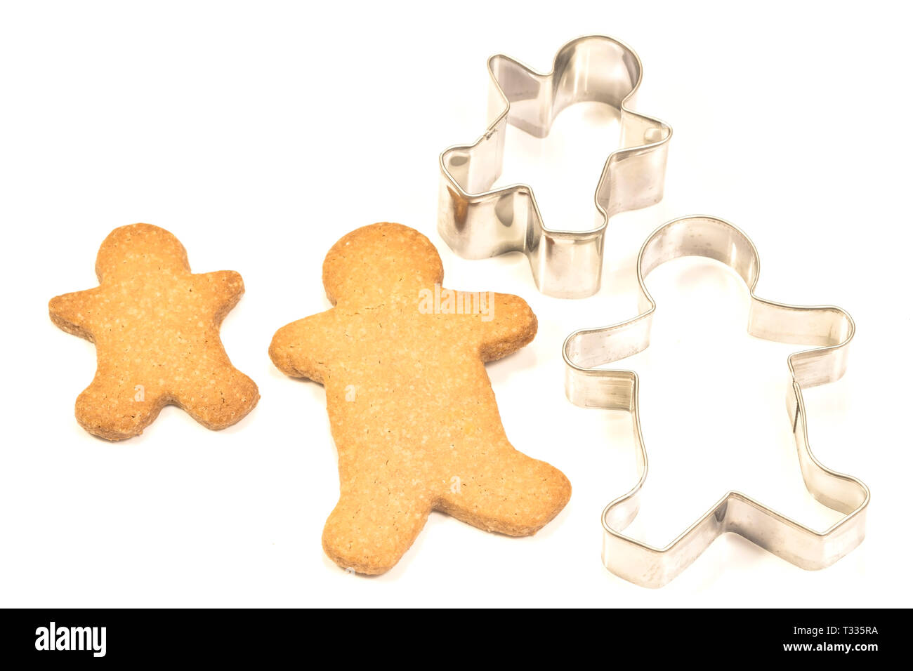 Gingerbread cookies with molds on white background Stock Photo