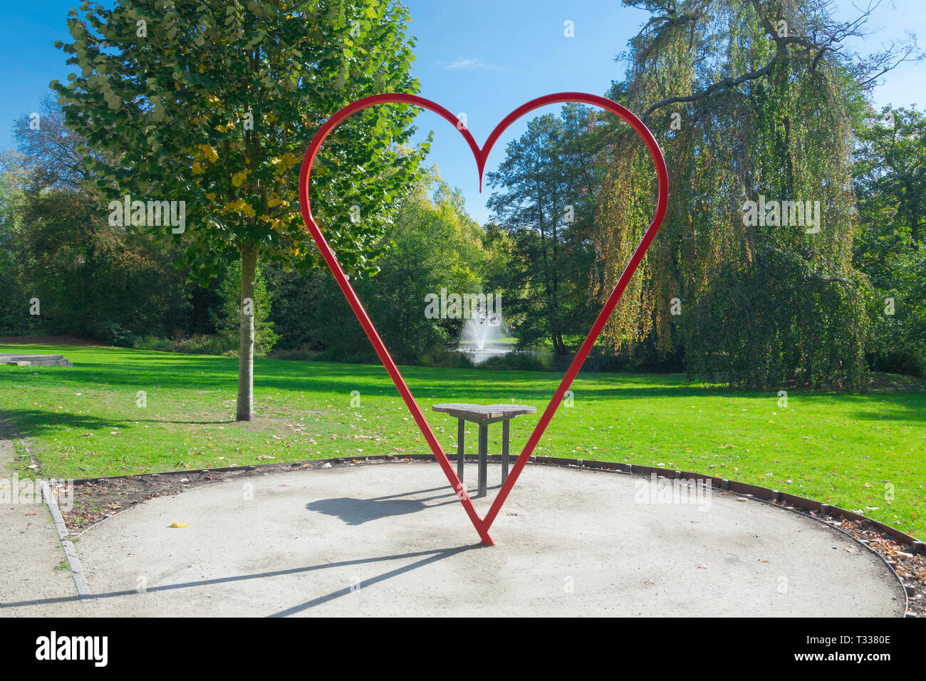 Waasmunster, Belgium - October 13, 2018, park Blauwendael castle with a large red heart that overlooks a fountain Stock Photo