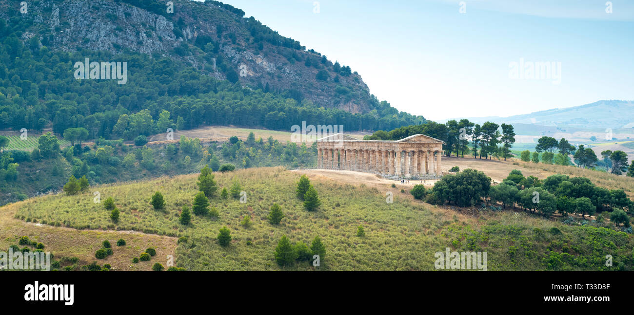 The ancient ruins of the stone Doric Temple of Segesta in the landscape, Sicily, Italy Stock Photo