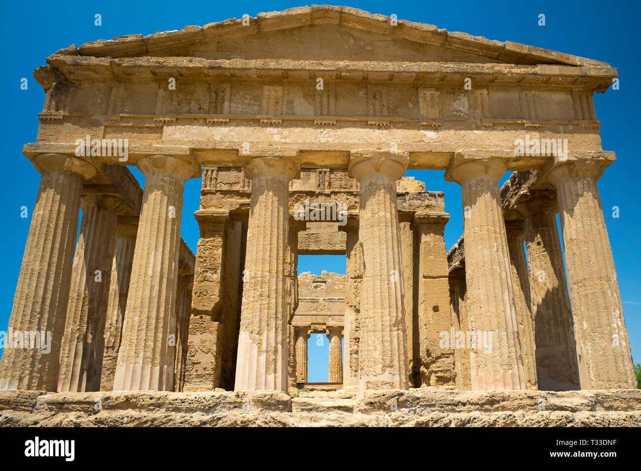 Temple of Concord ( Concordia) front close up view of columns, in the Valley of the Temples, Agrigento, Sicily, Italy Stock Photo
