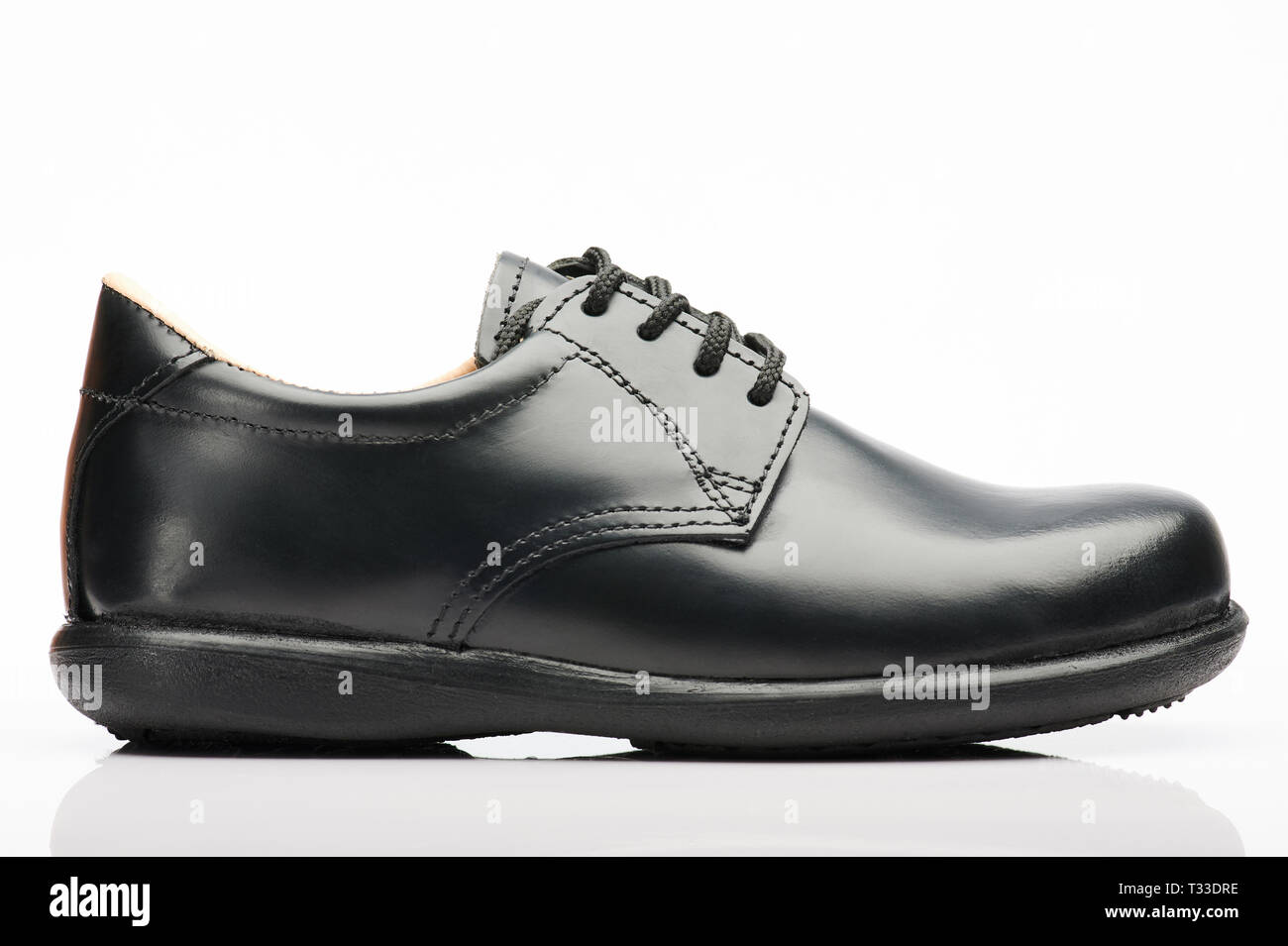 Black leather shoe back view isolated for office use Stock Photo Alamy