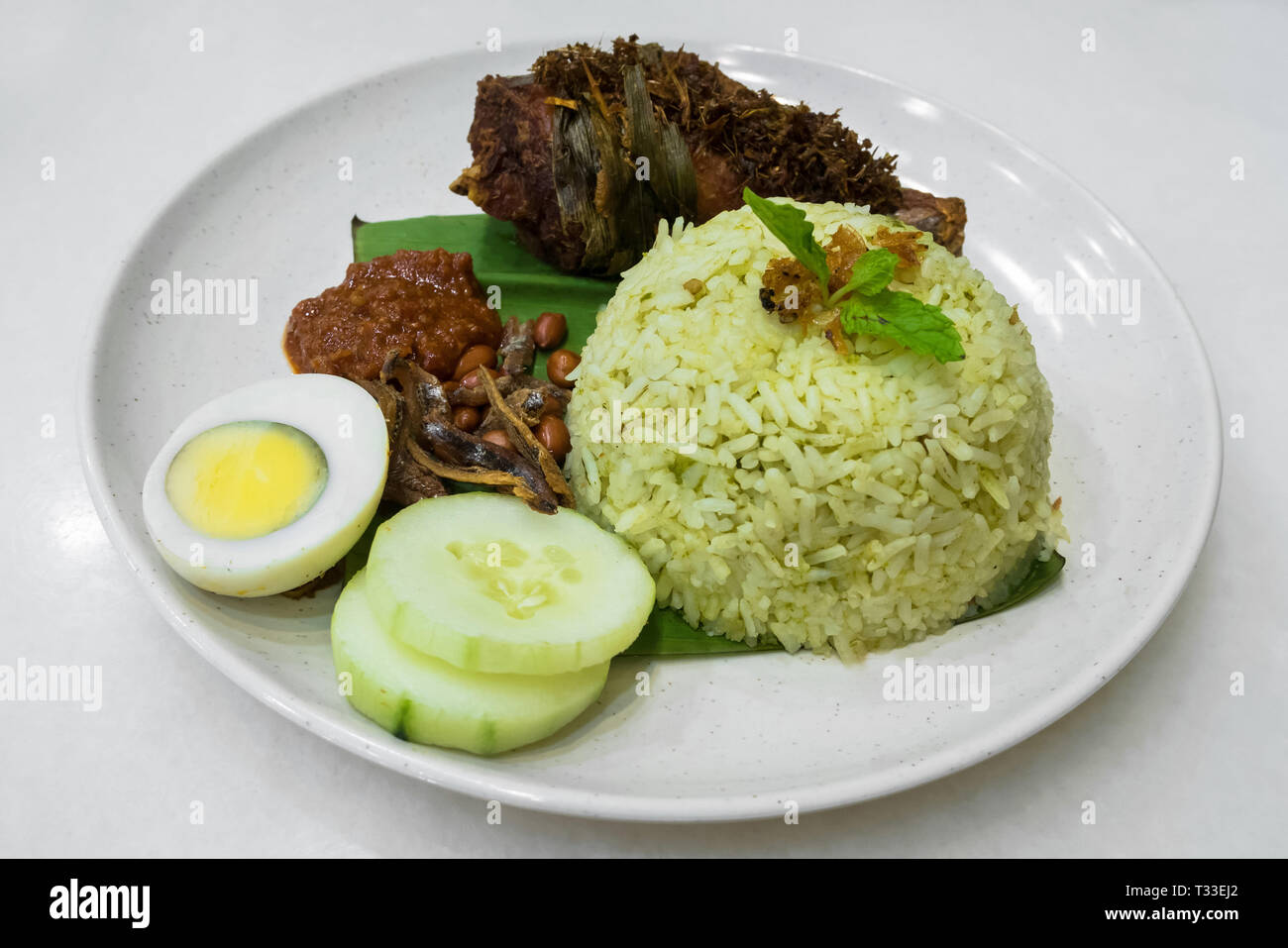 Nasi Lemak is one of the famous traditional malay local food in Malaysia. Stock Photo