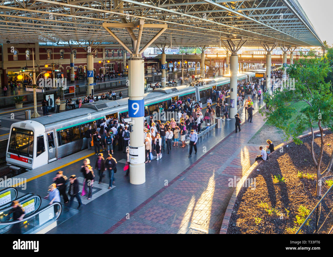 Commuters disembarking and boarding a TransPerth train at Perth Train Station Stock Photo