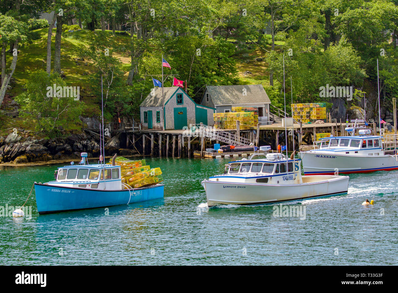 Lobster fishing trawlers in Lighthouse Cove and a fishing shack are