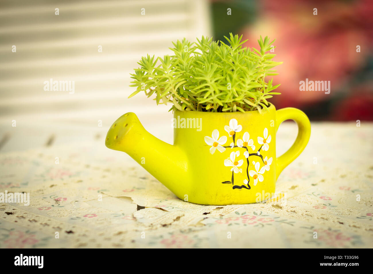 Green ceramic vase with plant leaves,vintage Stock Photo - Alamy