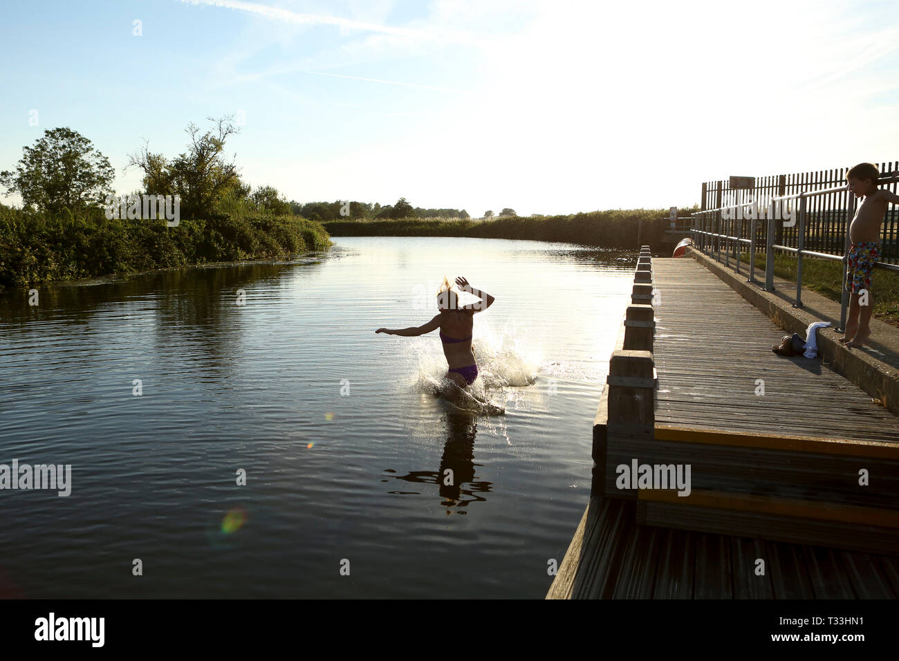 Child Girl River Jumping High Resolution Stock Photography and Images ...