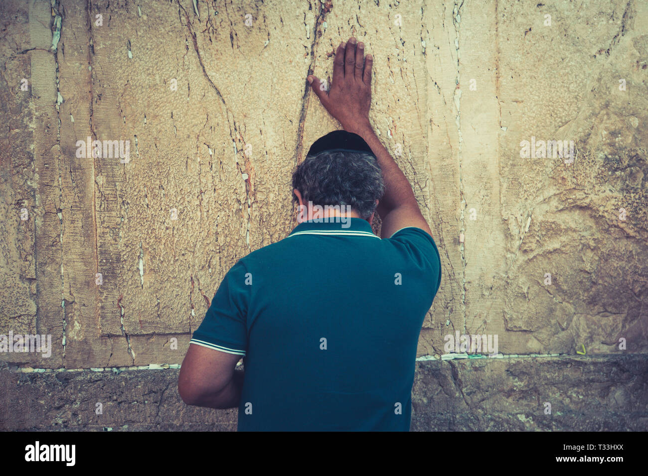 Man hand touching ancient wall hi-res stock photography and images - Alamy