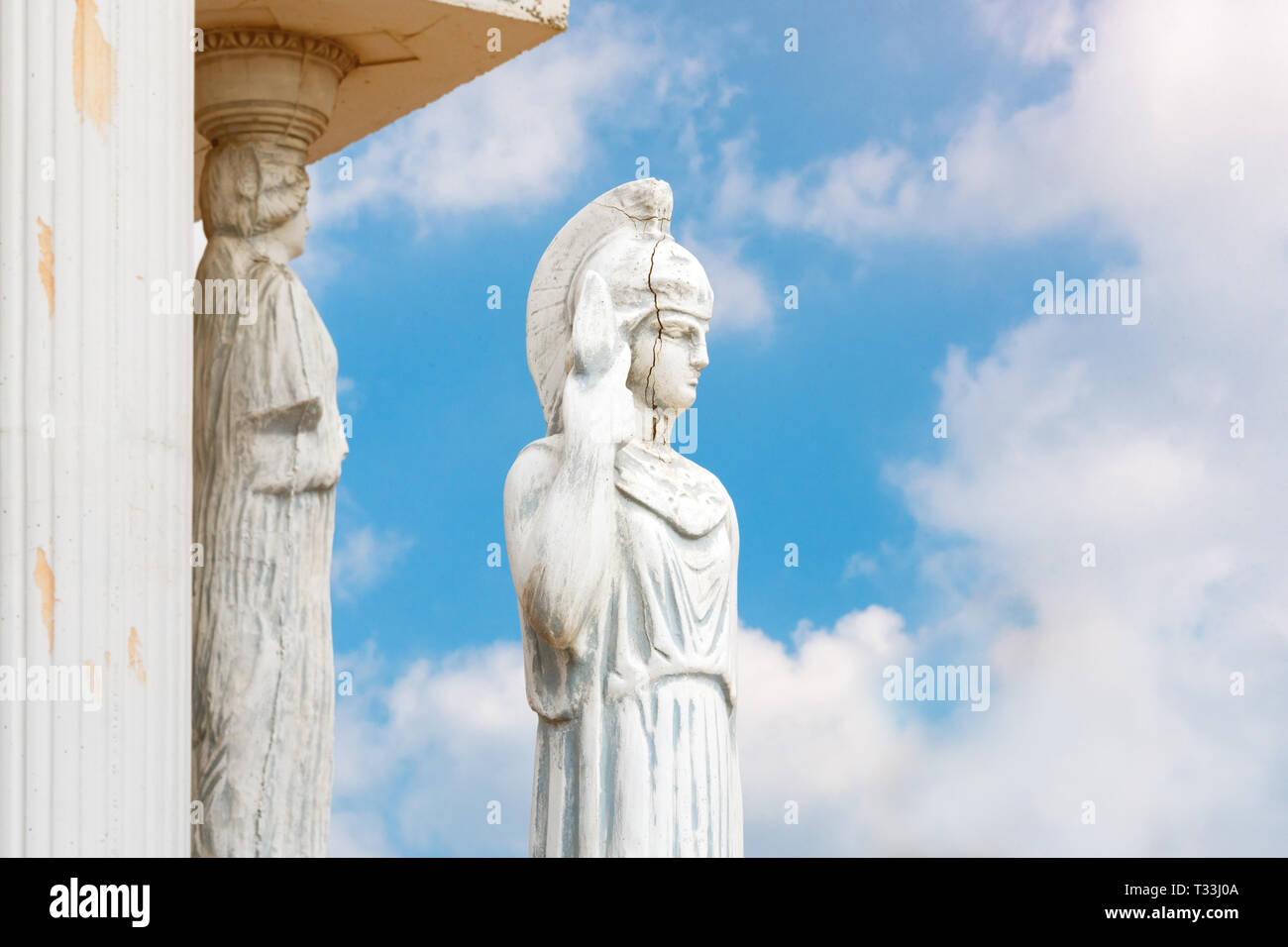 Woman with spear statue. Replica on ancient greek Athena sculpture in a