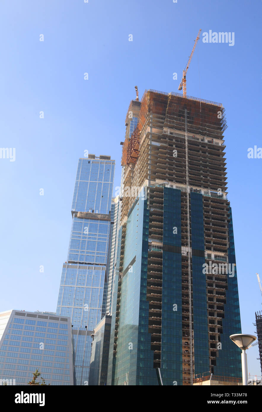 skyscraper develop on sky background Stock Photo - Alamy