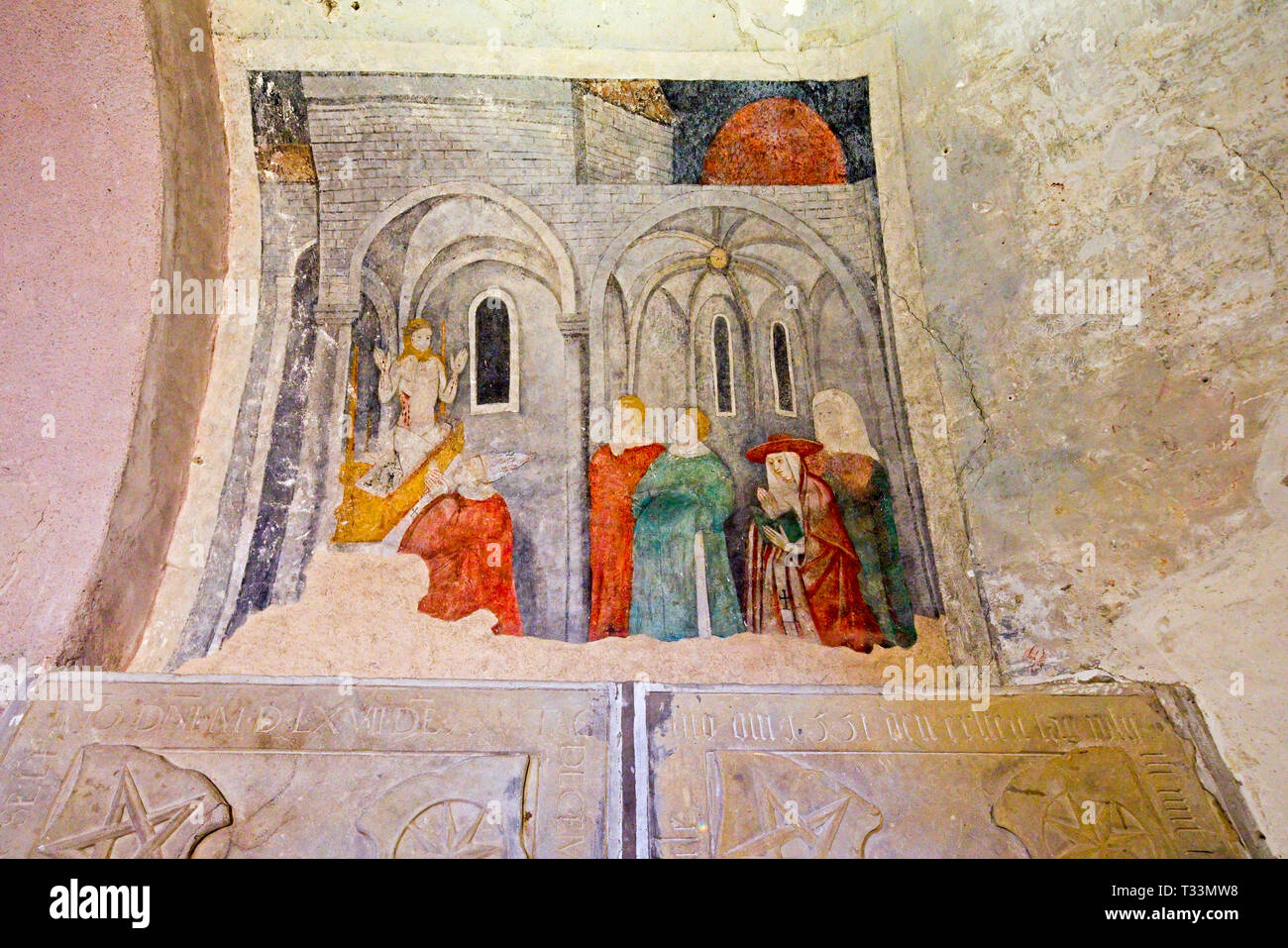 Wall paintings in Saint Peter and Saint Paul Church  in Ottmarsheim,  XI century, Alsace, France. Stock Photo
