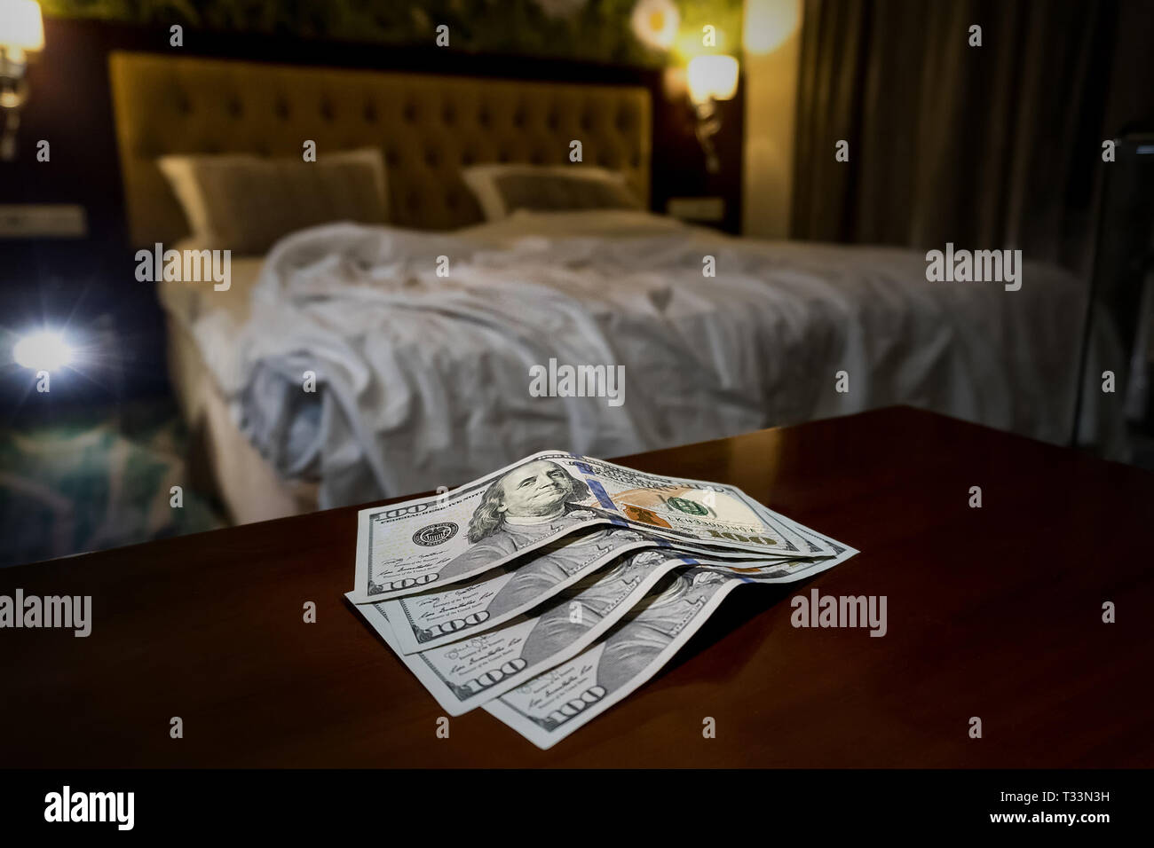 Tips at the bed for the housekeeper in hotel. Stock Photo